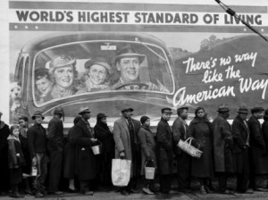 Famous image of African American flood victims lined up to get food & clothing fr. Red Cross relief station in front of billboard ironically extolling  "world's highest standard of living/ there's no way like the American  way."